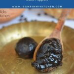 Winter Home Remedy made with black peppercorns on a wooden spoon in a plate