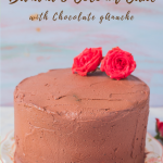 Eggless Banana coconut cake with chocolate ganache on a cake stand with roses