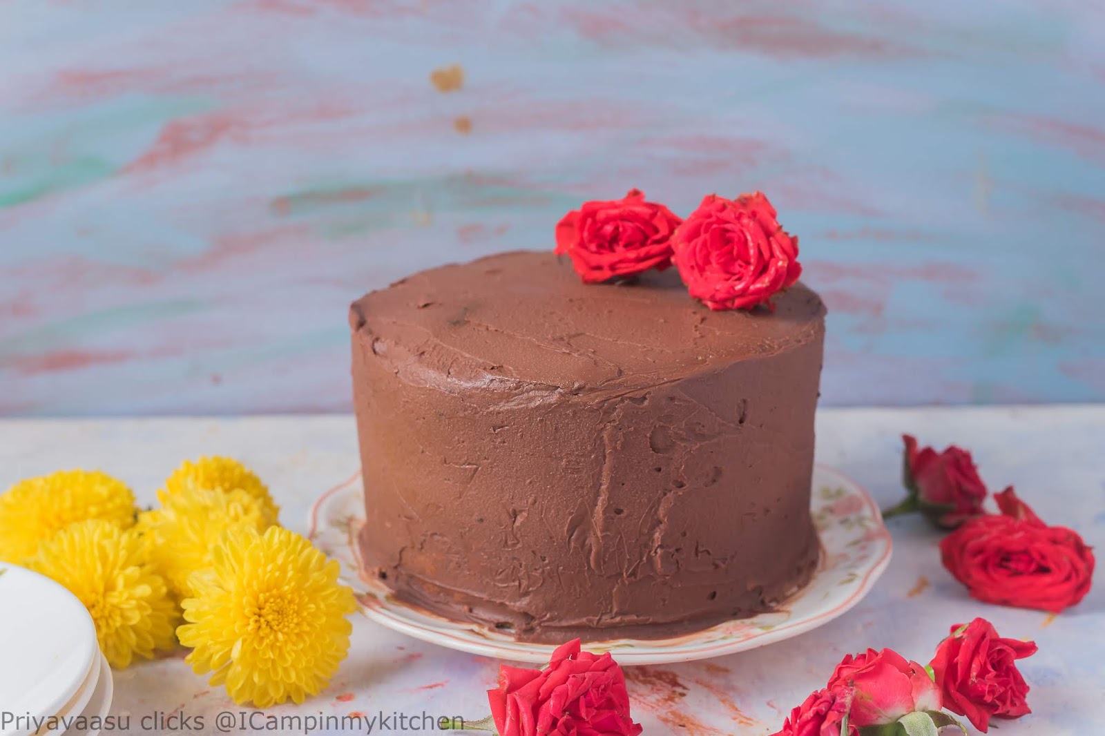 Banana cake with coconut flavors decorated with chocolate ganache