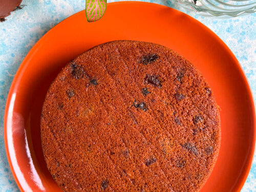 No alcohol, Eggless Christmas fruit cake in a terracotta plate