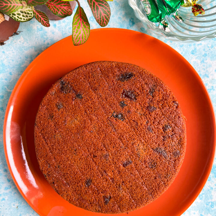 No alcohol, Eggless Christmas fruit cake in a terracotta plate