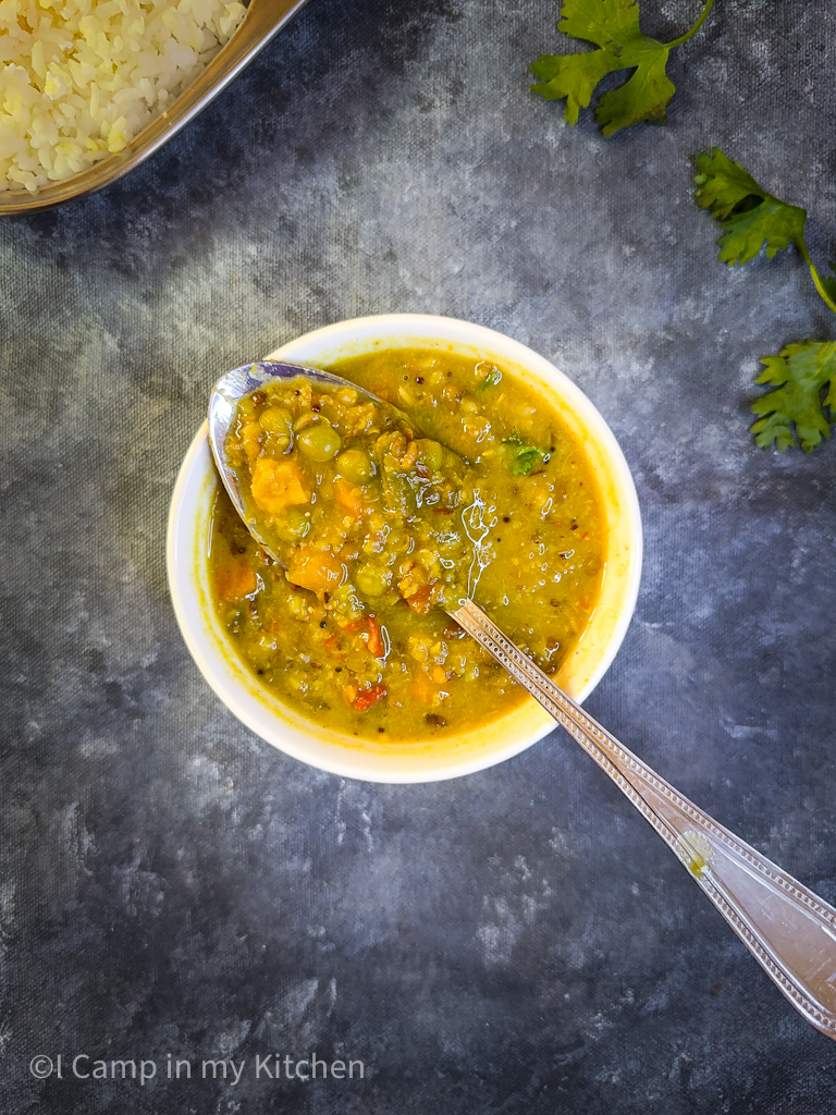 Tangy kootu with mixed vegetables in pressure cooker