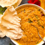 Bisibela bath served with ghee and appalam