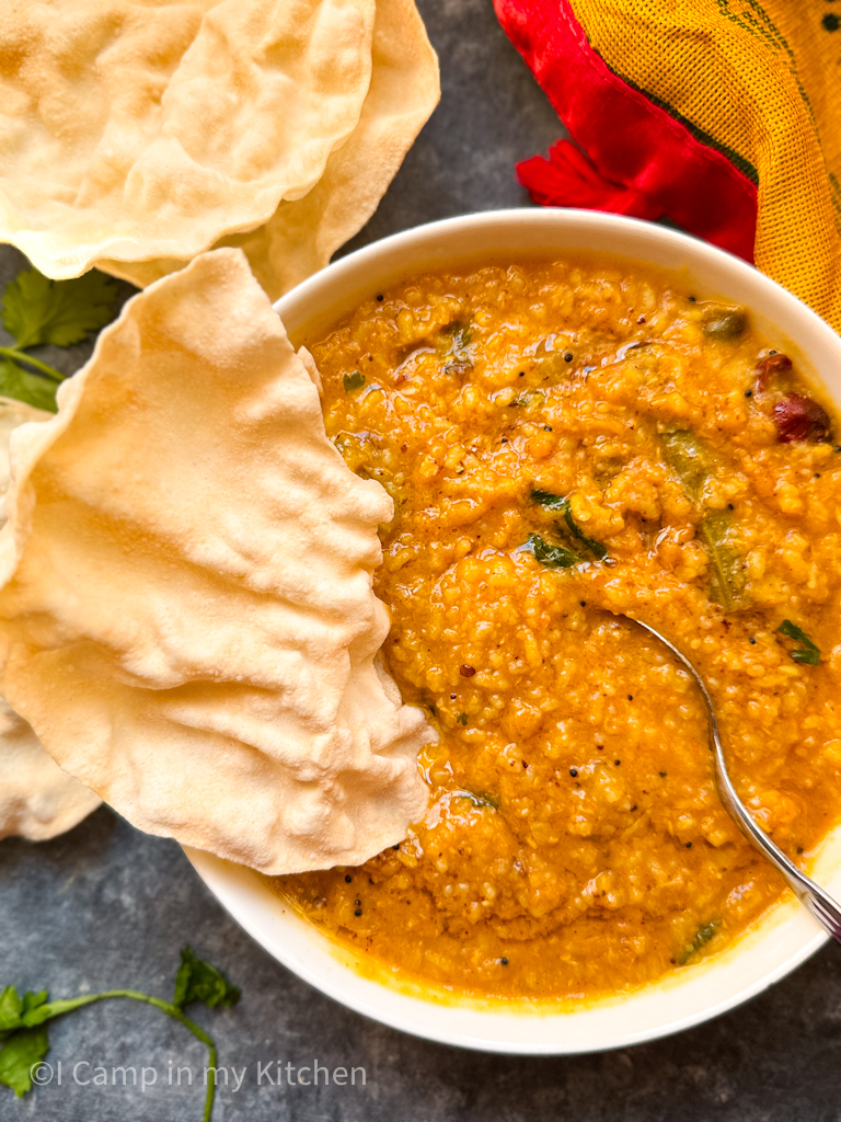 Bisibela bath served with ghee and appalam