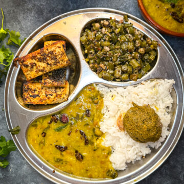 Simple vegetarian lunch with rice, potato peas dal and paneer